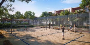 Residents playing volleyball at Allure Avani outdoor sports court