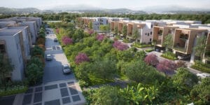 Beautiful green landscape at Allure Avani with lush trees, plants, and open natural spaces