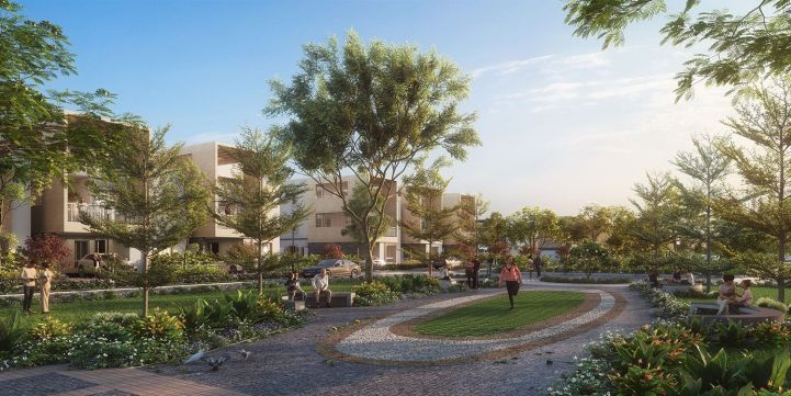 Beautiful green landscape at Allure Avani with lush trees, plants, and open natural spaces